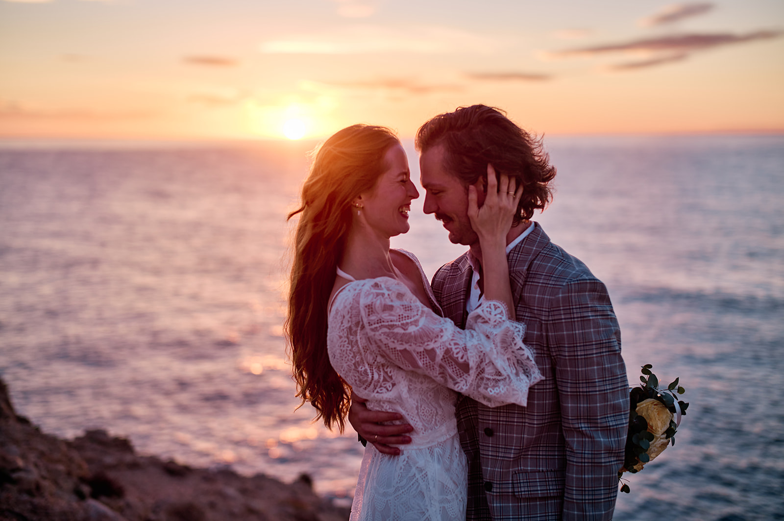 Couple at the Capdepera headland at dawn, Mallorca
