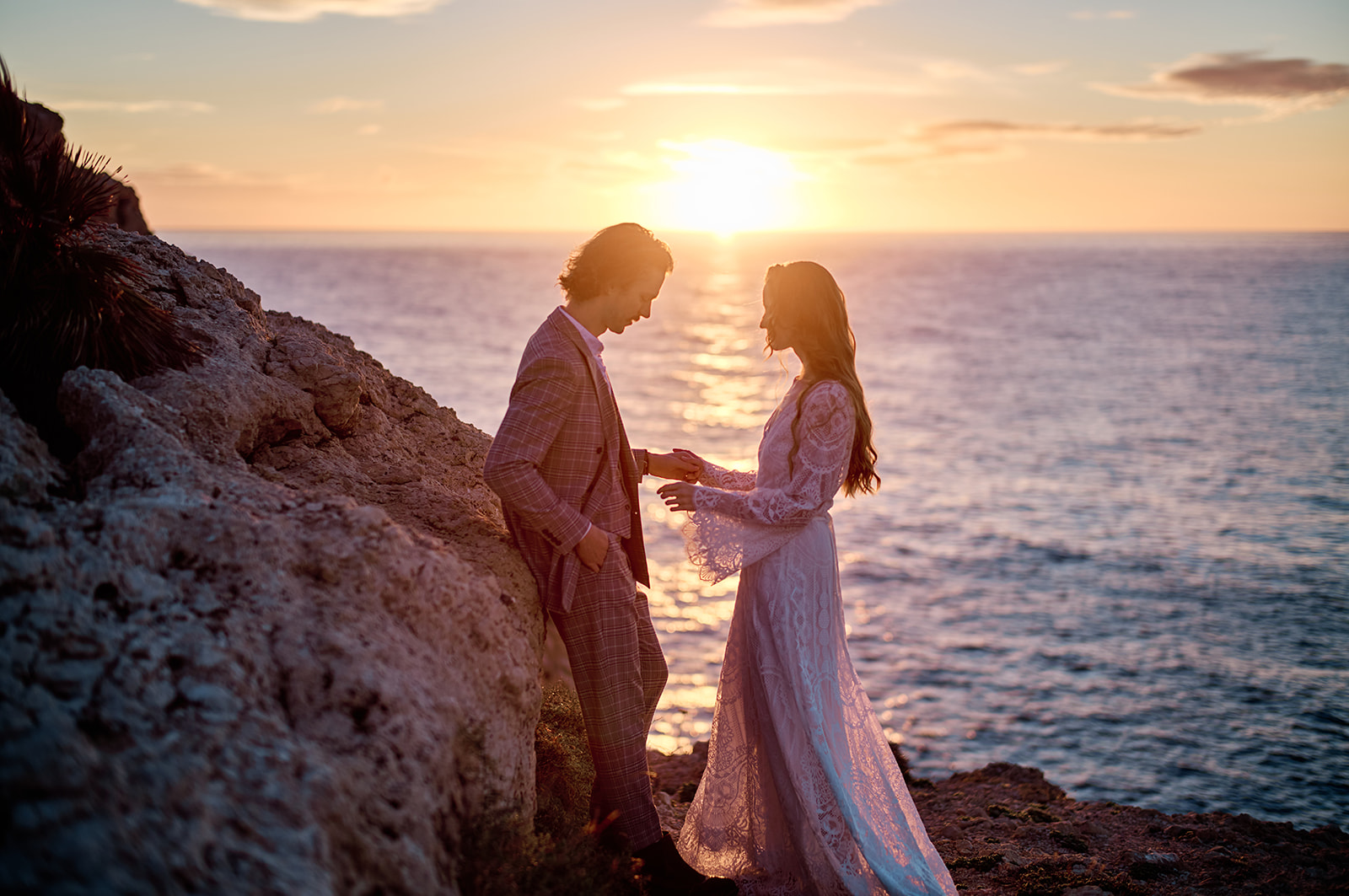Couple at the Capdepera headland at dawn, Mallorca