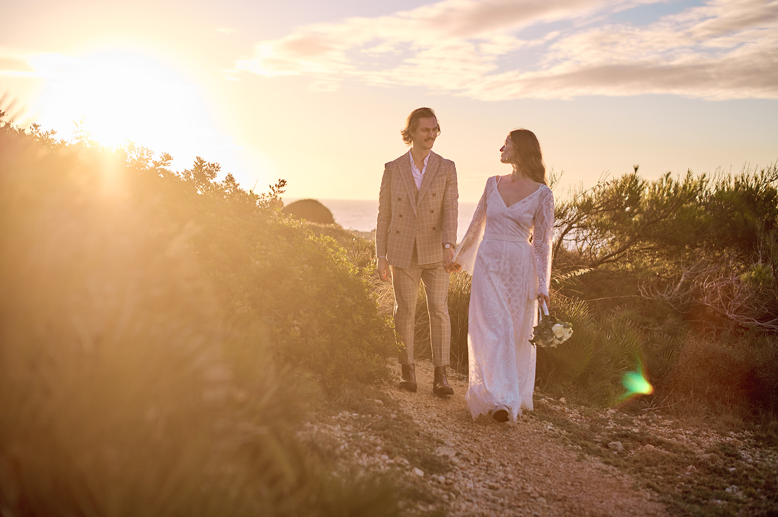 Couple at the Capdepera headland at dawn, Mallorca