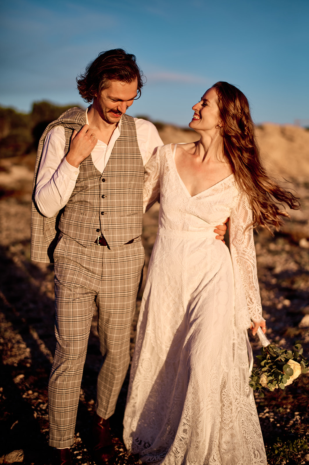 Bride and groom on the east coast of Mallorca at sunrise