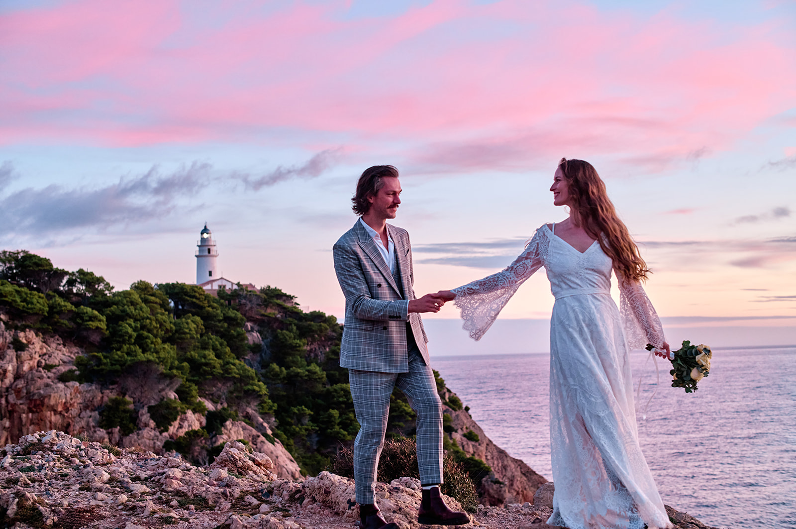 Couple at the Capdepera headland at dawn, Mallorca