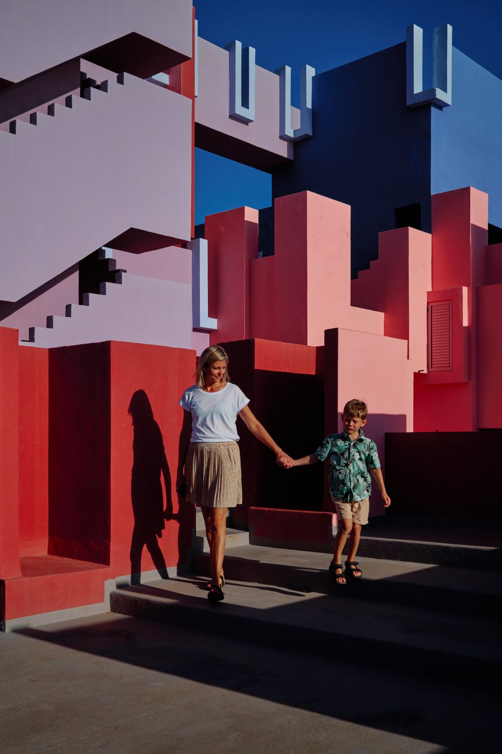 Therese and our son walking down the steps of La Muralla Roja on her 40th birthday trip