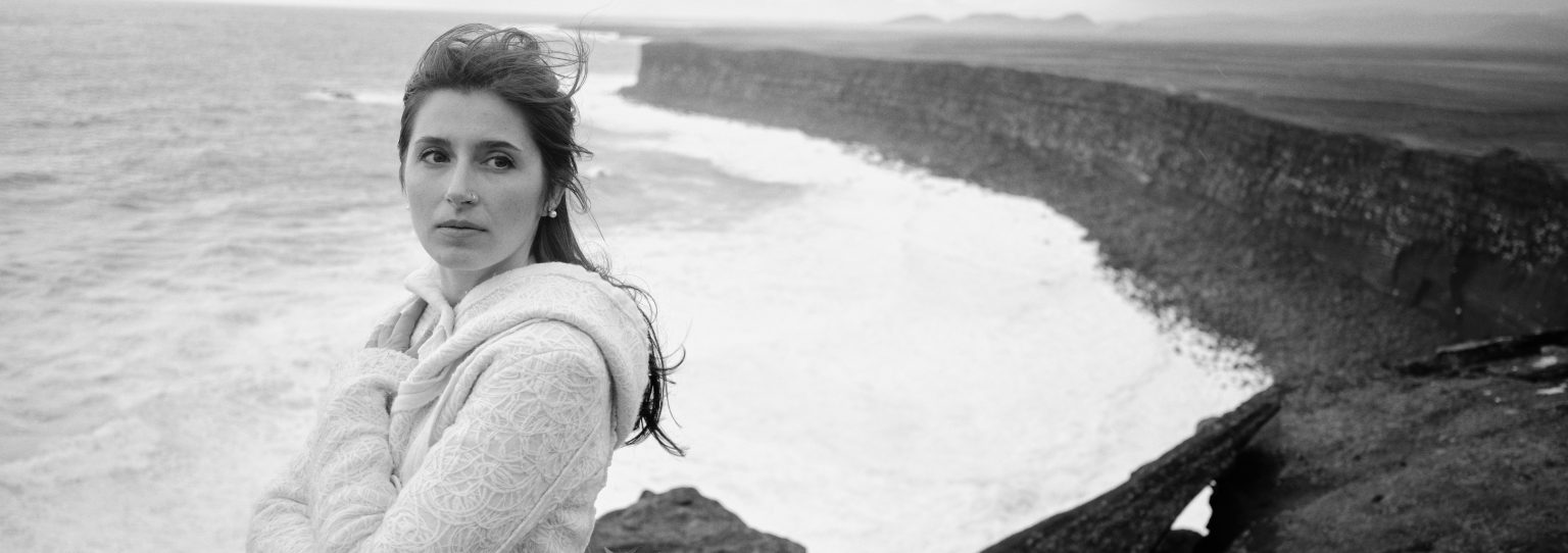 Bride on the cliff edge above the Atlantic, Reykjanes