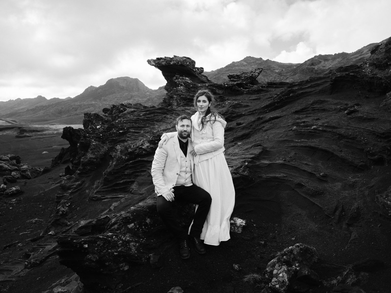 The couple on a crag in the Krýsuvík hills, Reykjanes elopement