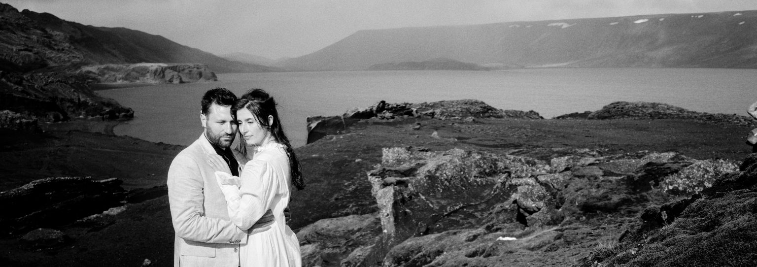Andreea and Matthias embracing above Kleifarvatn lake