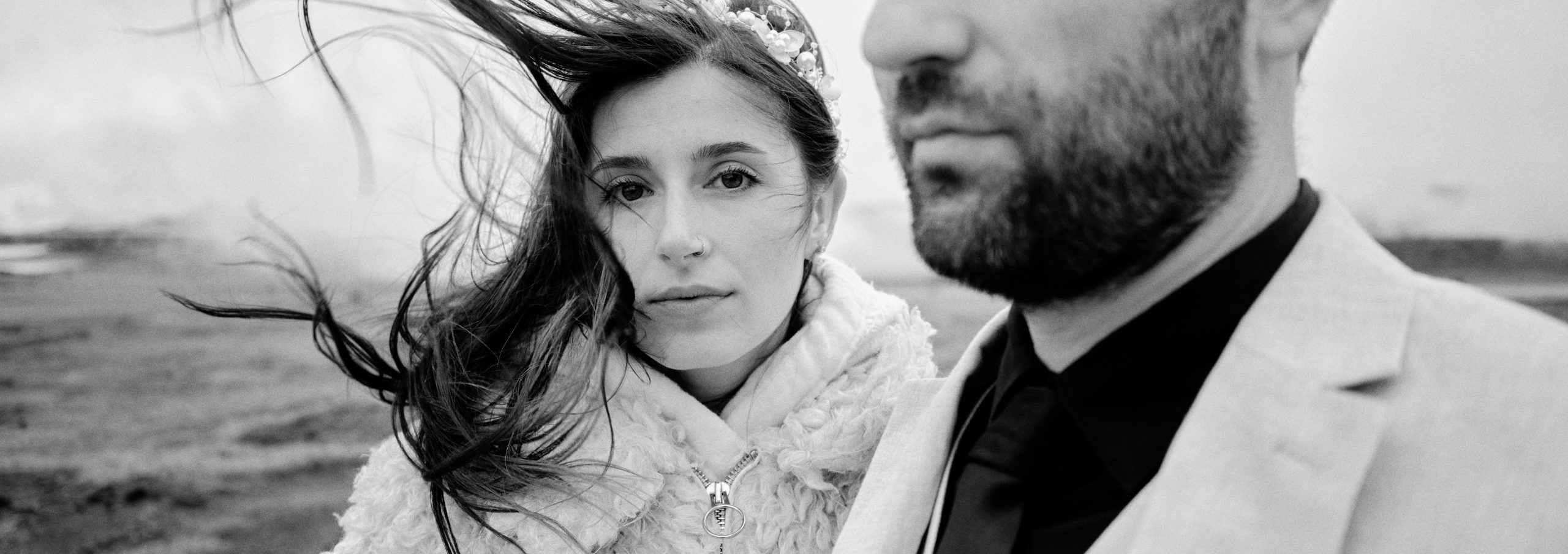 Close black and white portrait of Andreea and Matthias, Reykjanes