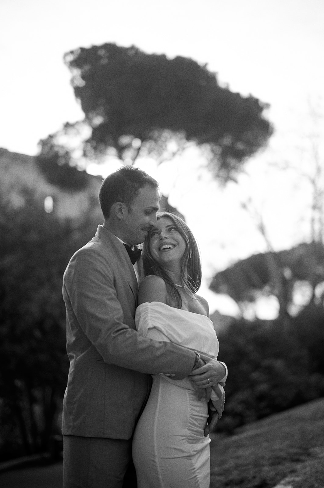 Couple in golden light beside the Colosseum, Rome