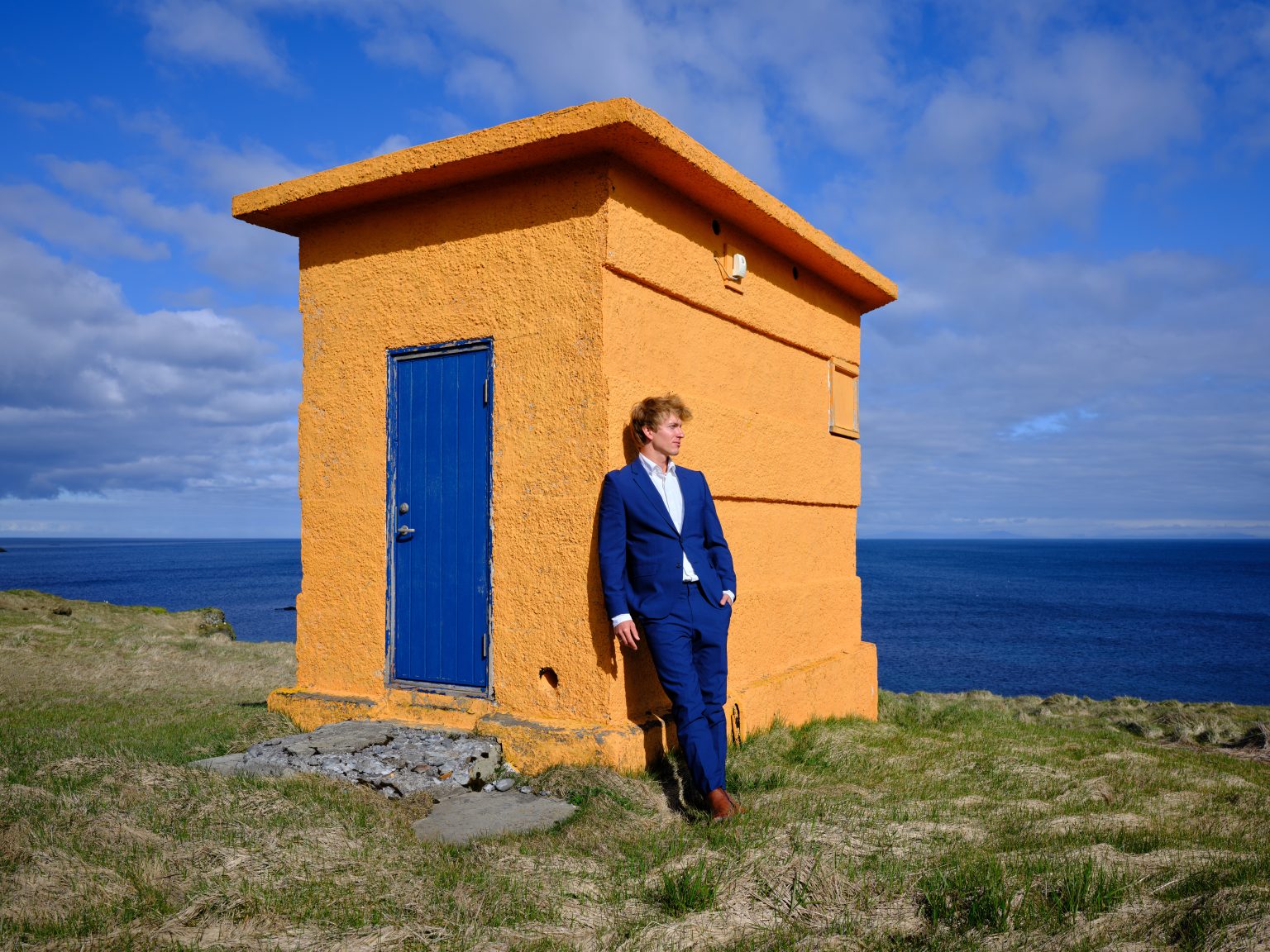 The bright orange Svörtuloft lighthouse on the Snæfellsnes coast