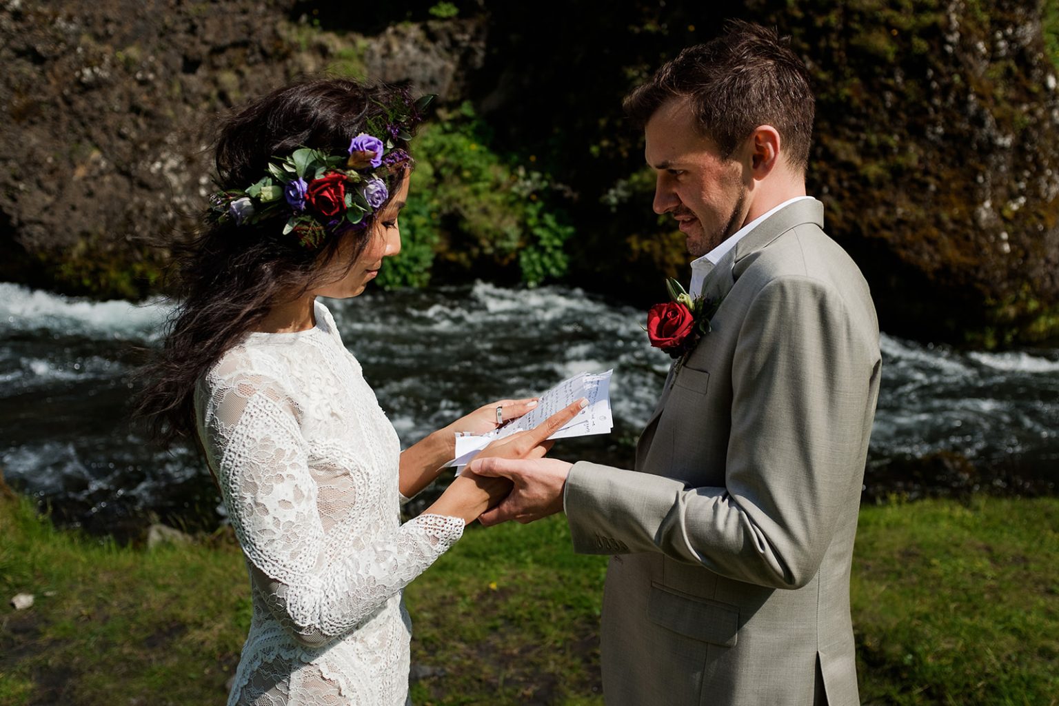 Ring exchange at a private ceremony below Kvernufoss, South Iceland elopement