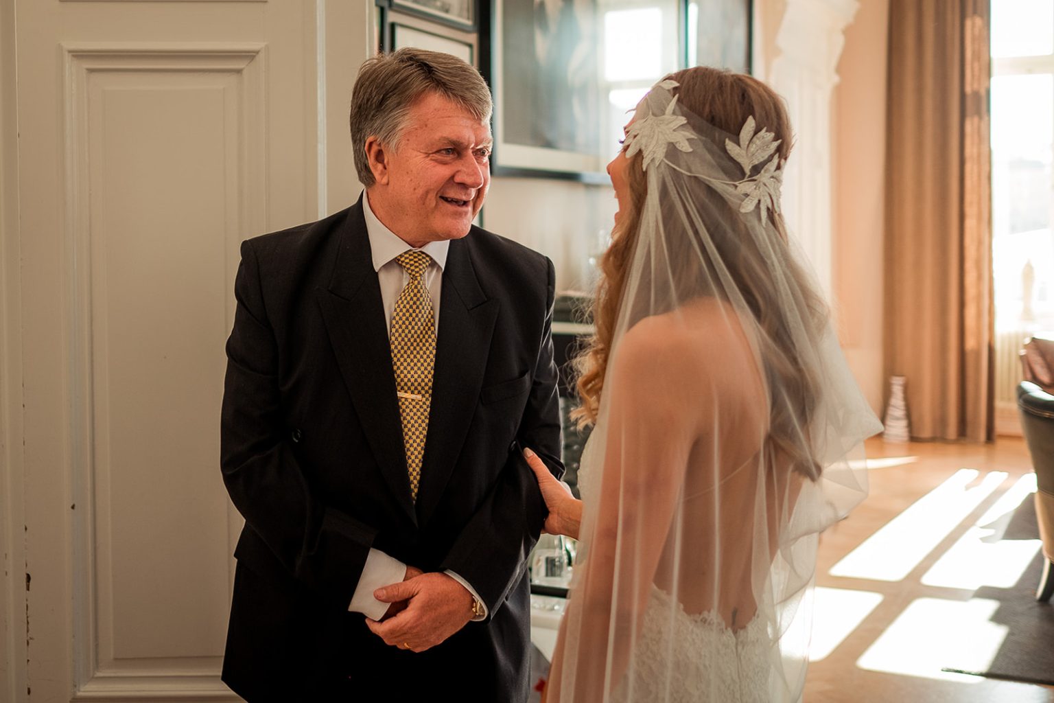 The bride's father seeing her before the Stockholm wedding