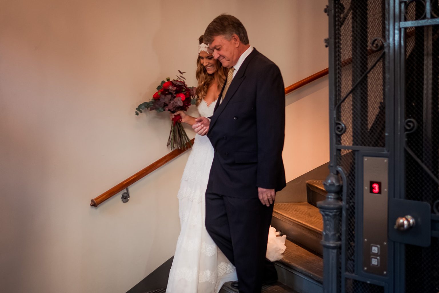 Bride and groom on the stairs before the ceremony