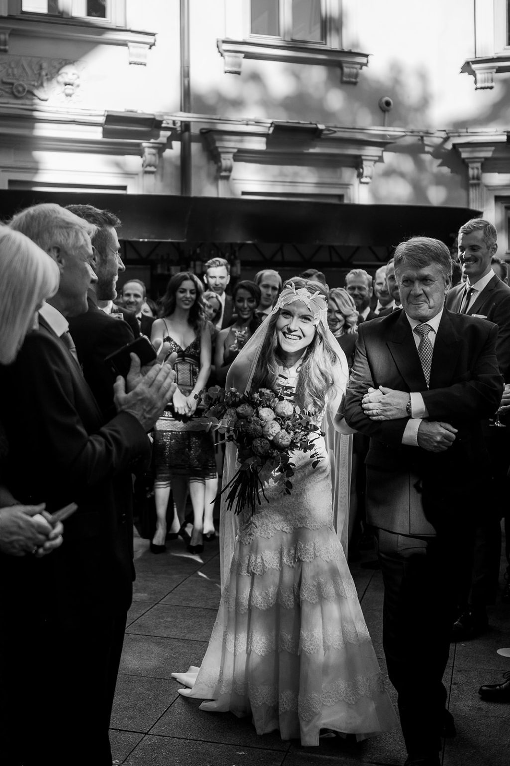 The bride with her bouquet after the ceremony