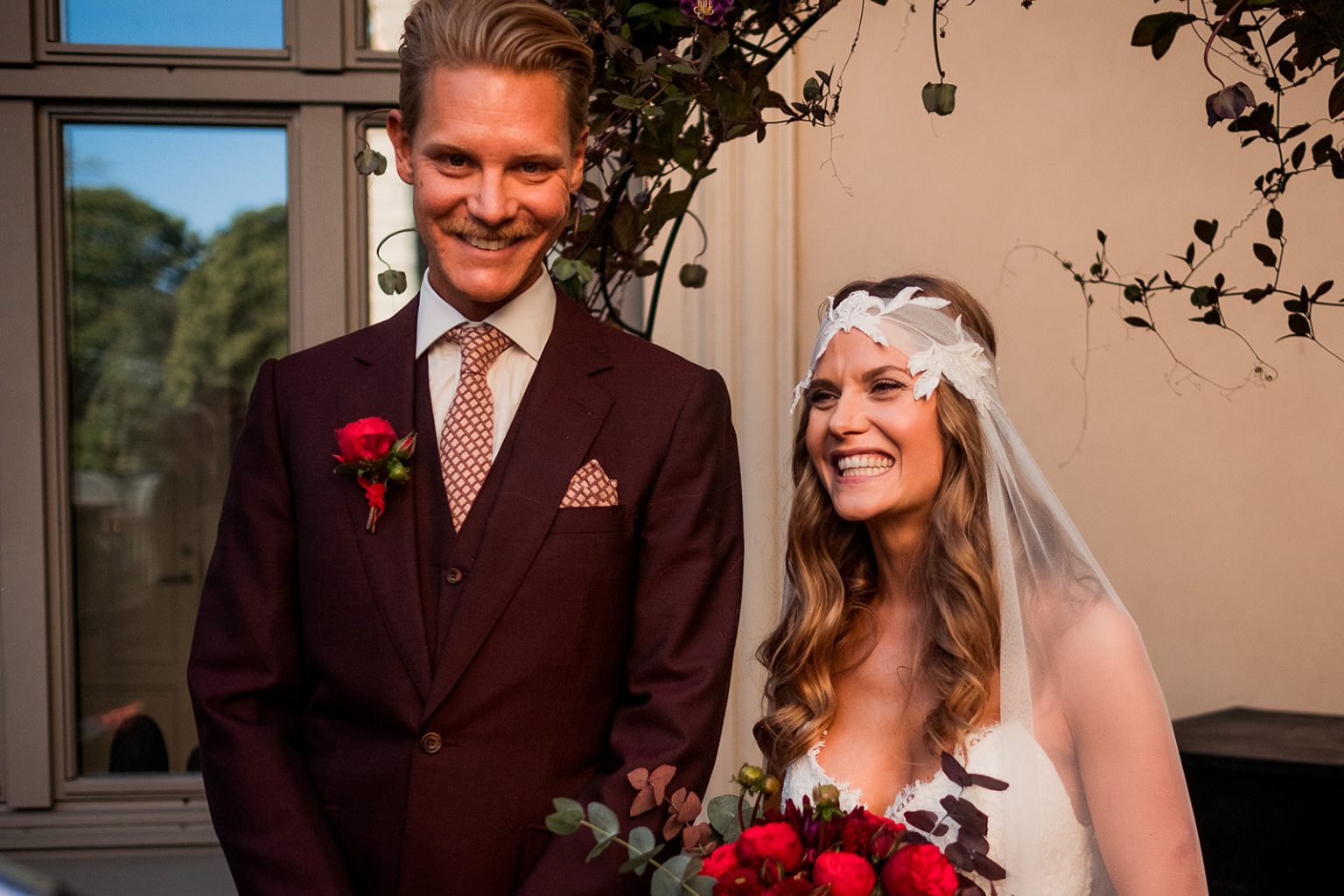 Bride and groom laughing together after the ceremony
