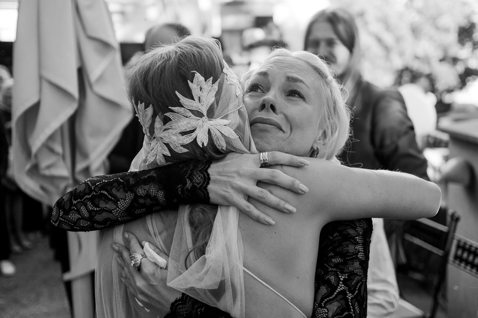 An emotional hug during the courtyard celebration