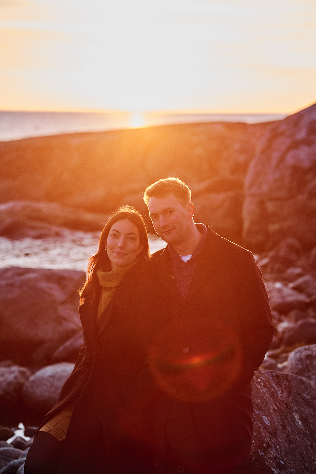 Couple in the morning light on the Swedish Baltic coast near Hop Farm Beach - Nordica Photography