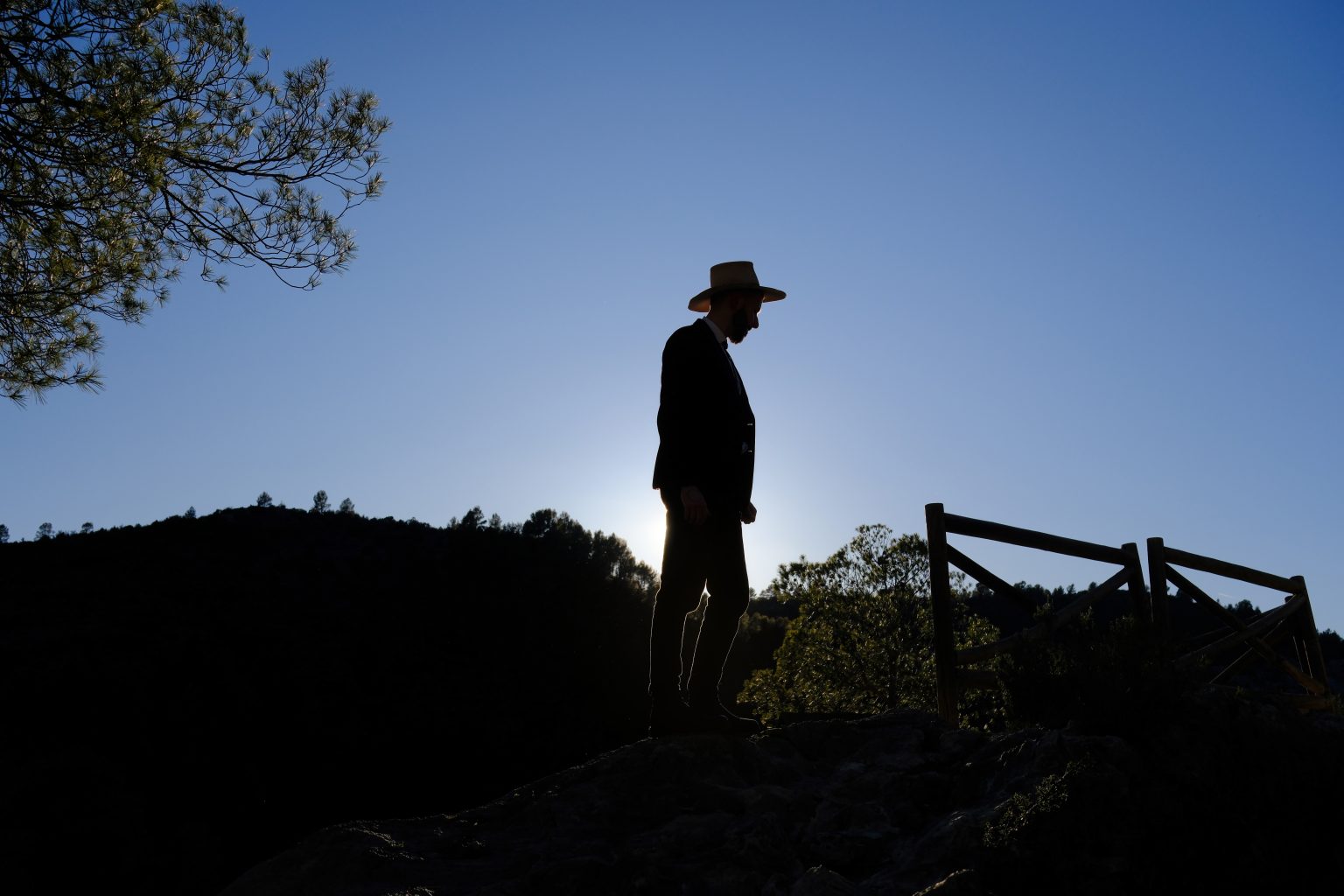 Ondrej silhouetted on a ridge above the gorge, Costa Blanca