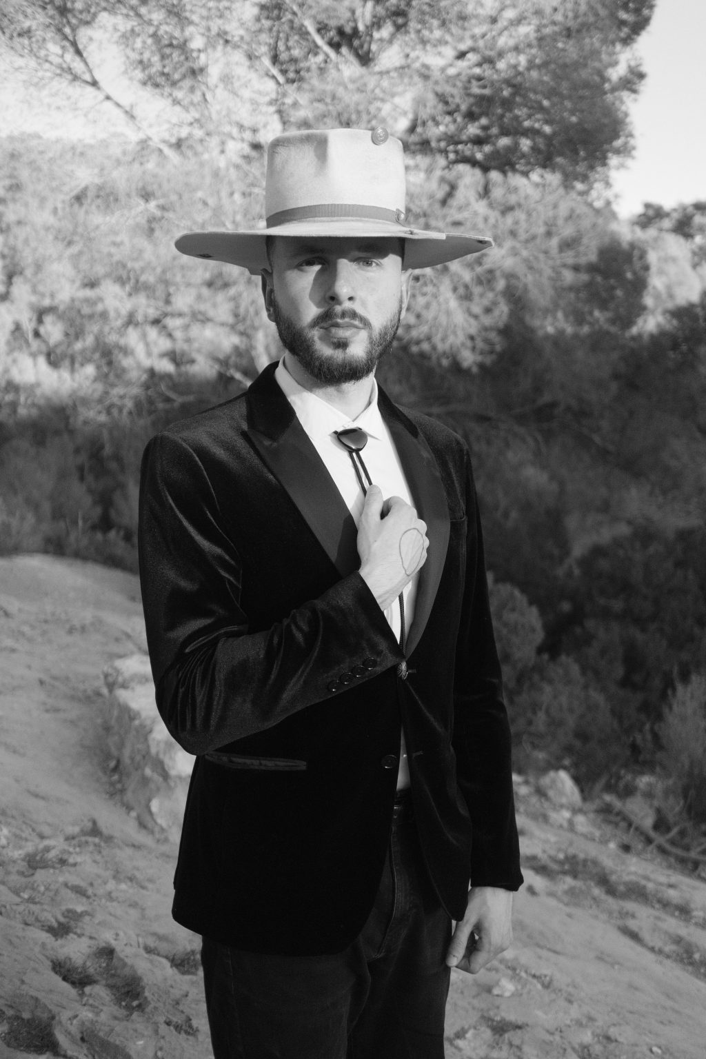 Black and white portrait of Ondrej in a wide-brim hat, Valencia