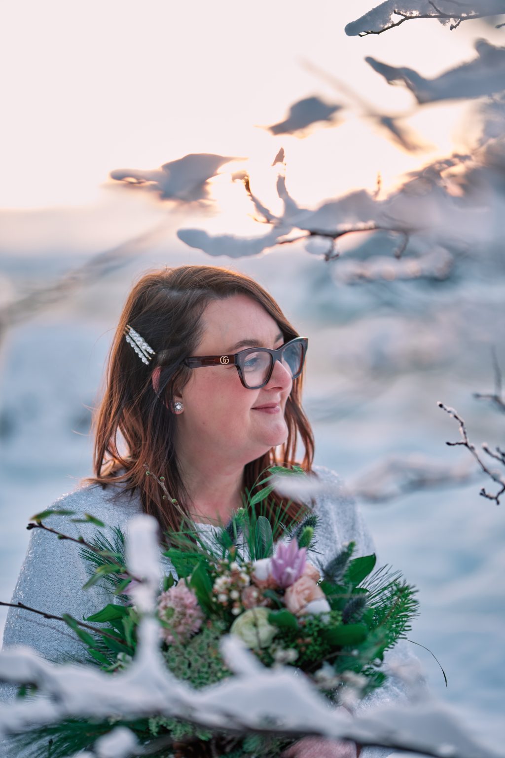 Black and white portrait of the bride in the snow, winter elopement Sweden