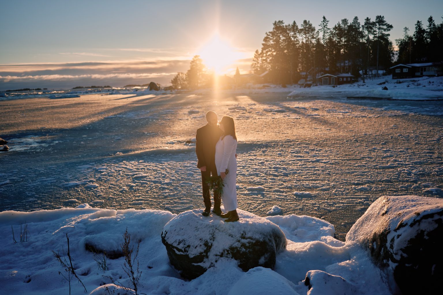 A burst of winter sun on the snow, a Scandinavian elopement