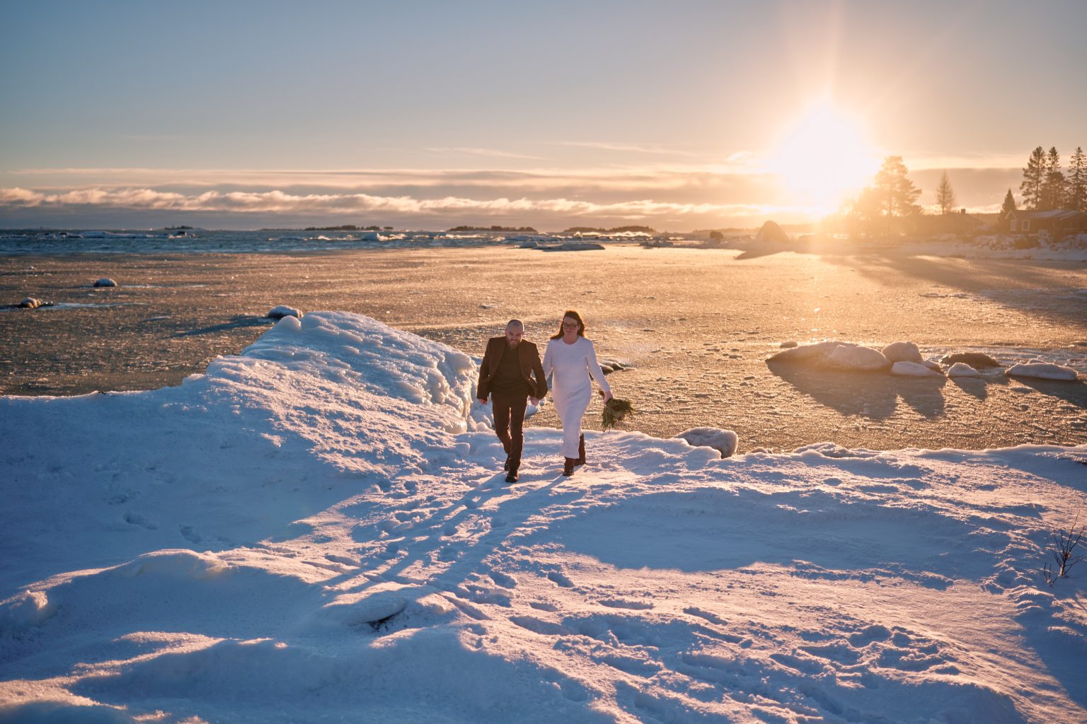 Crossing the open snow in the winter sun, Sweden