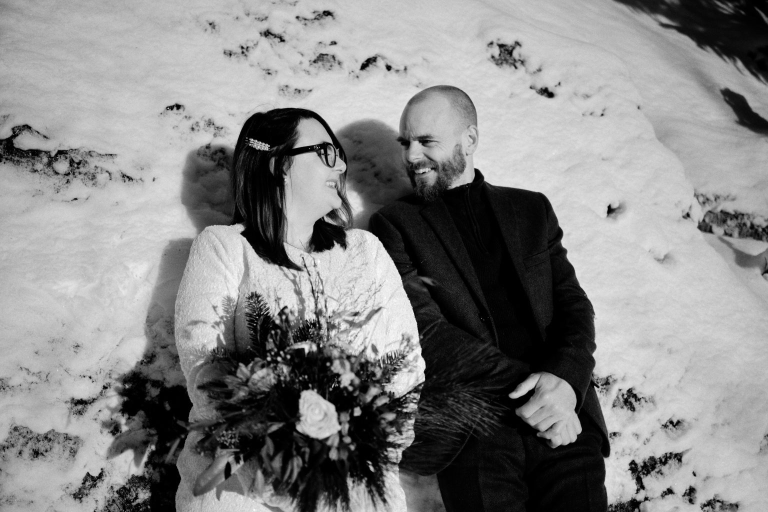 The couple in black and white winter sun, Sweden
