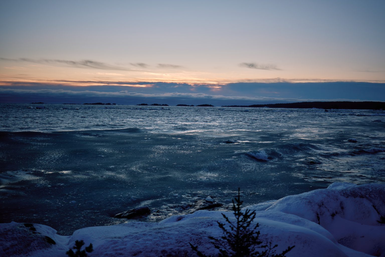 Sea ice on the Bothnian coast at last light, winter in Sweden