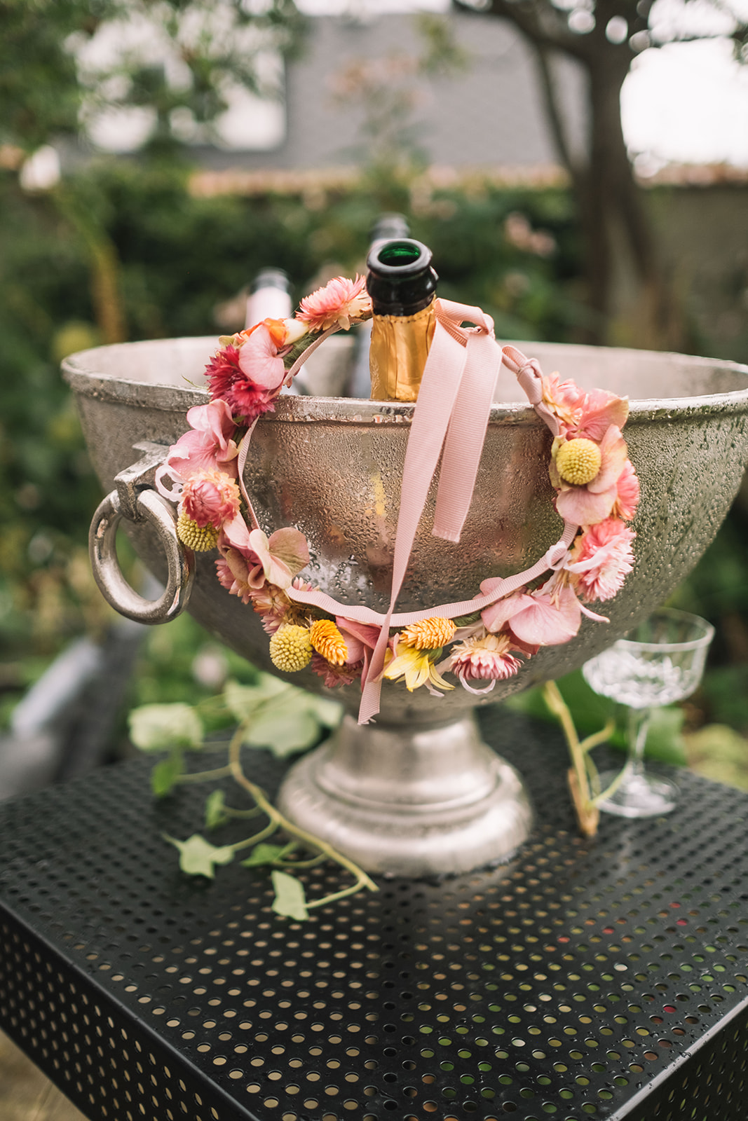 Flowers and drinks set out in the garden