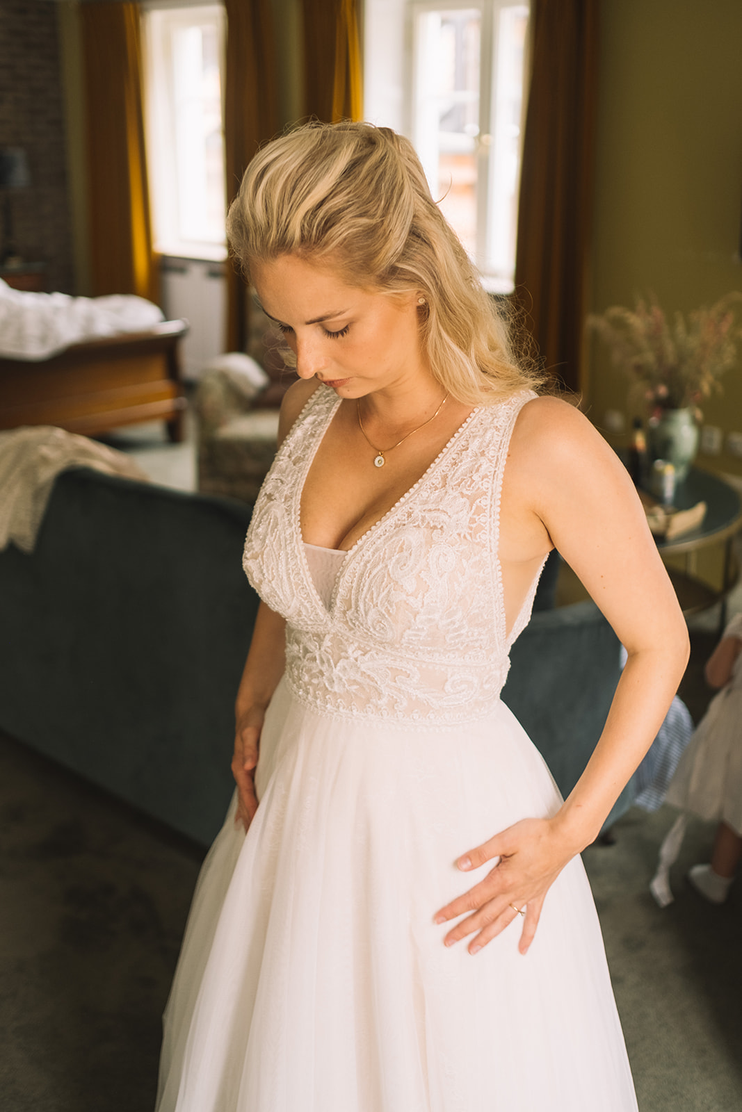 The bride in her dress before leaving the hotel