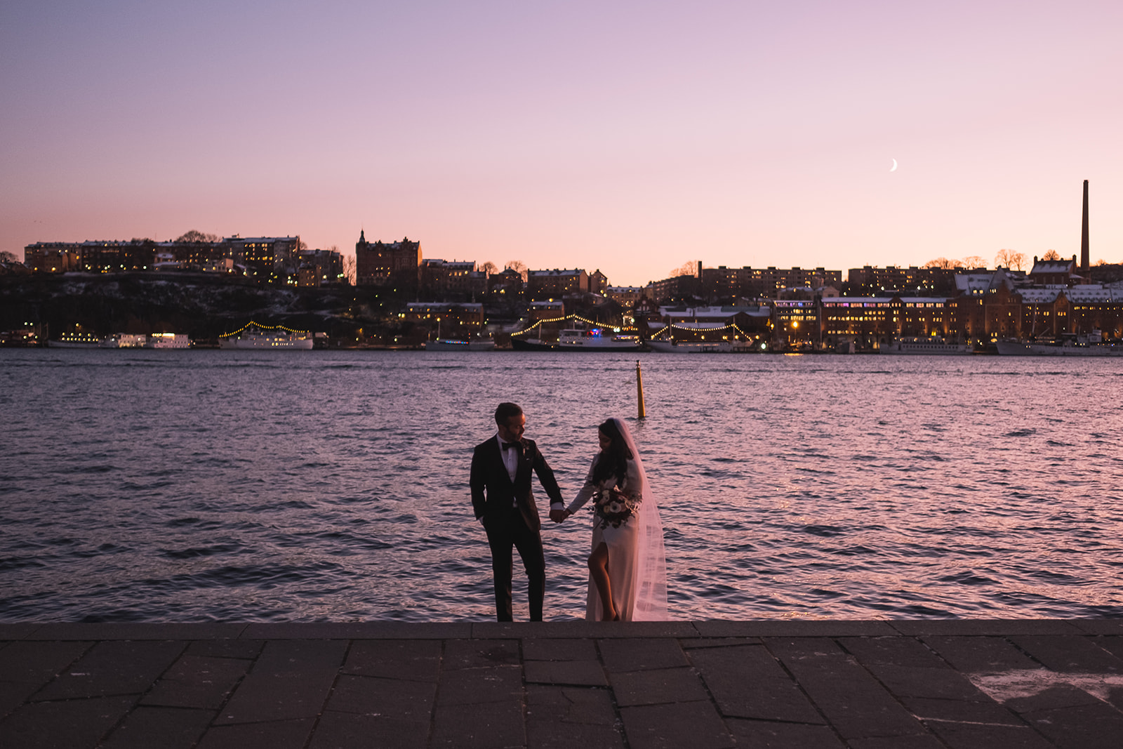 The couple on the City Hall terrace with Stockholm behind them