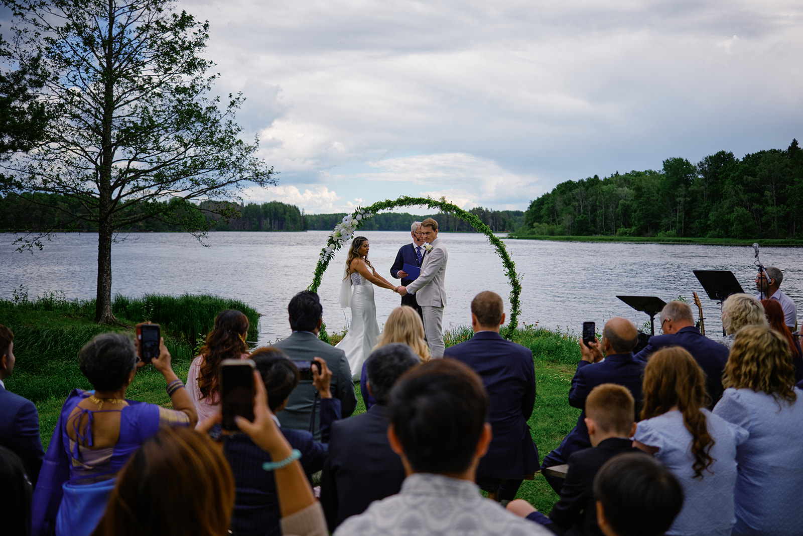 Guests watching the ceremony by the Dal&auml;lven