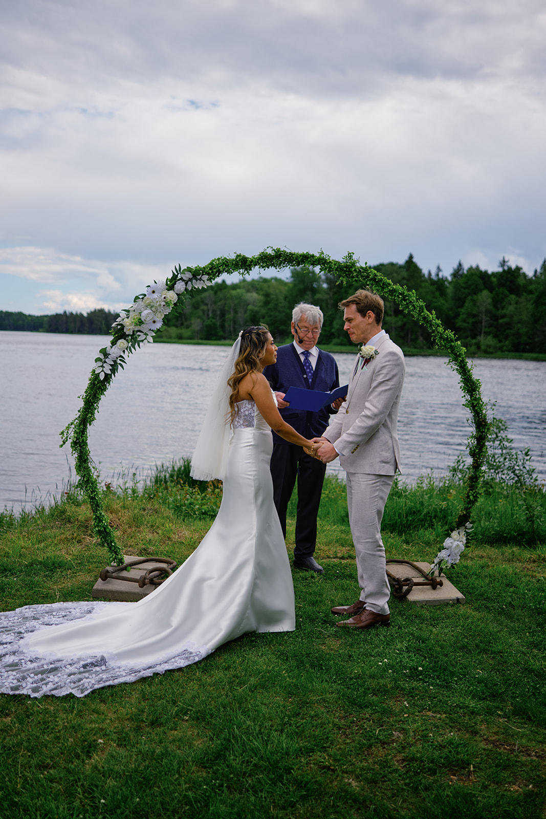 The couple after the ceremony under the arch