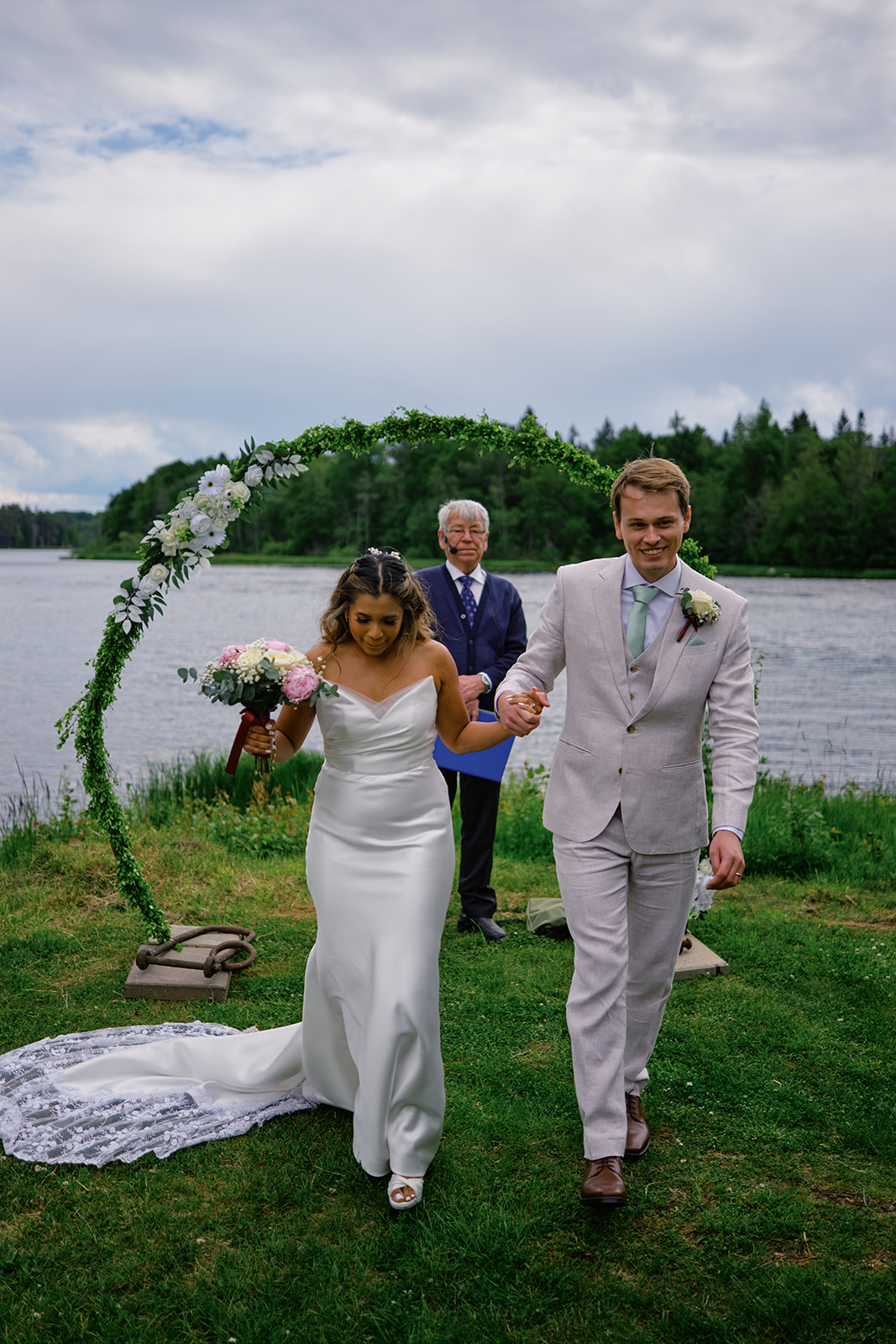 Walking back through the arch as a married couple