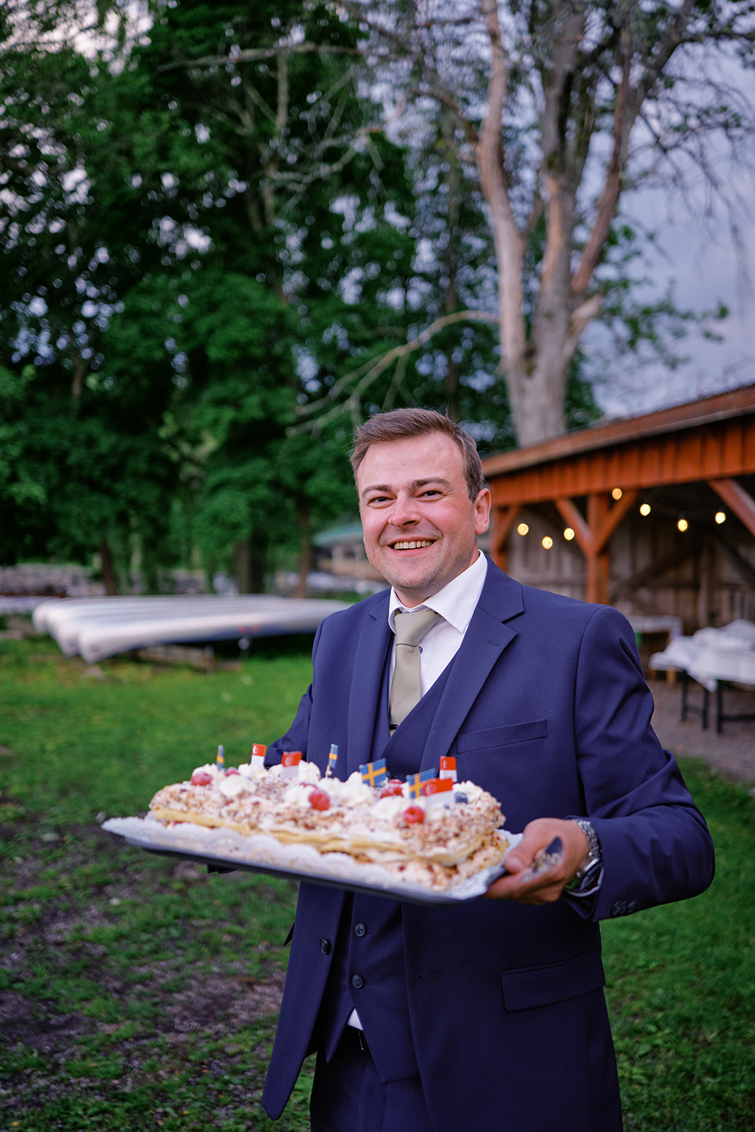 The wedding cake carried in to the tipi