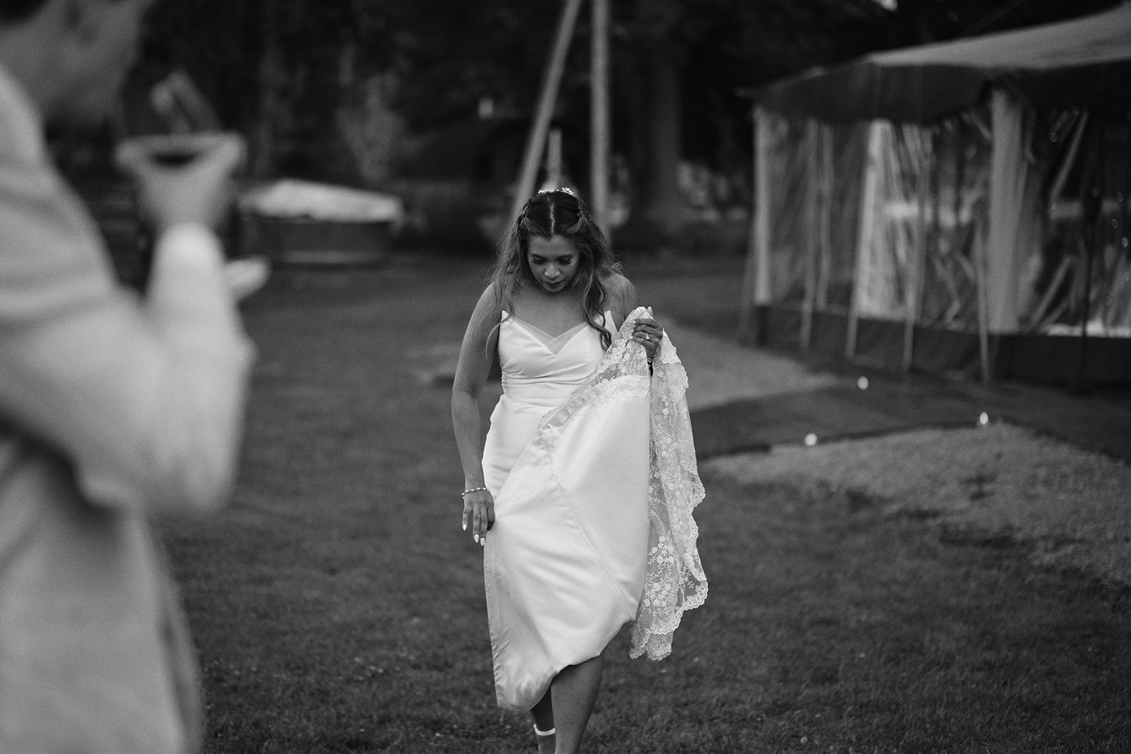 The bride outside the tipi at night, black and white