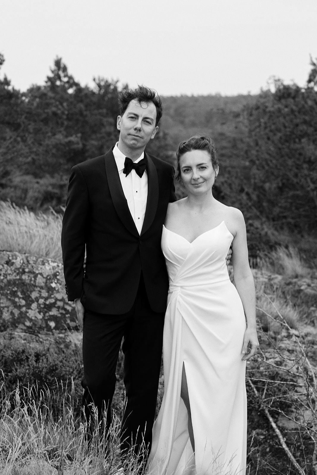 A close wedding portrait by the sea, black and white