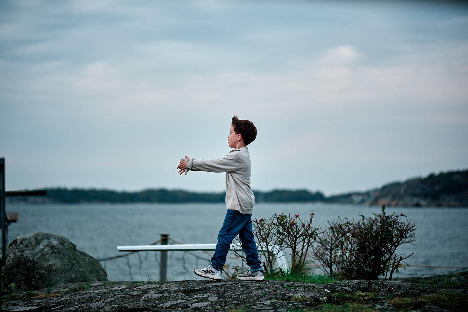 A boy by the water at Hov&aring;s Kallbadhus